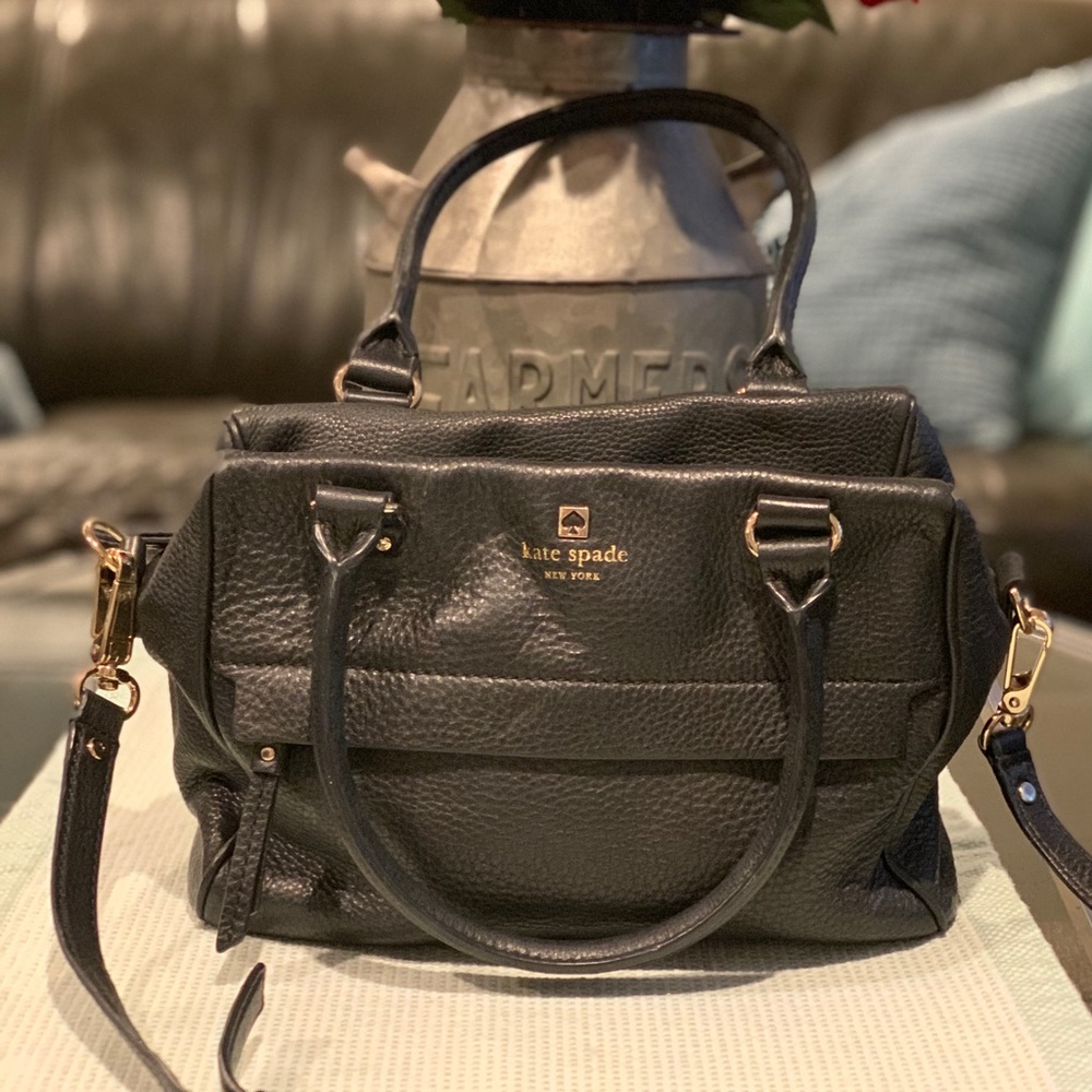 Black Kate Spade handbag with long shoulder strap